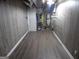 Spacious basement area featuring vinyl floors and paneled walls at 1742 Pine Fort Cir, Dacula, GA 30019