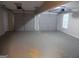 Two-car garage with ample space, with neutral walls and white doors at 1742 Pine Fort Cir, Dacula, GA 30019