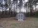 A view of the backyard shed with double doors at 1742 Pine Fort Cir, Dacula, GA 30019