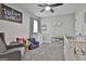 Cozy Bedroom with crib, glider, and changing table perfect for a new baby at 2112 Highway 54, Moreland, GA 30259