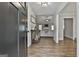 Inviting foyer featuring hardwood floors and views into the living area, creating an open and welcoming atmosphere at 2112 Highway 54, Moreland, GA 30259