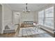 Play room with natural light, stylish decor, and ample space for play, creating a fun environment at 2112 Highway 54, Moreland, GA 30259