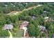 A high angle view of the home and its surroundings, highlighting its location near a golf course at 157 Glen Eagle Way, Mcdonough, GA 30253
