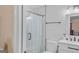 Bathroom featuring a glass shower with tile and a white toilet and vanity at 157 Glen Eagle Way, Mcdonough, GA 30253