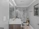 Bathroom with a glass-enclosed shower, a sink with counter, and a large mirror at 157 Glen Eagle Way, Mcdonough, GA 30253