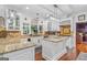 Well-appointed kitchen with granite counters, tile backsplash, and ample cabinet space at 157 Glen Eagle Way, Mcdonough, GA 30253