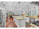 Spacious kitchen with large island, granite countertops, and stainless steel appliances at 157 Glen Eagle Way, Mcdonough, GA 30253