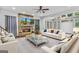 Spacious living room with a stone fireplace and plush furnishings, perfect for entertaining at 157 Glen Eagle Way, Mcdonough, GA 30253