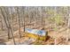 Wooden outbuilding surrounded by bare trees at 313 Dingler Rd, Moreland, GA 30259