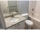Bathroom features a granite countertop vanity, toilet, and a shower-tub combination at 40 Canterbury Dr, Grantville, GA 30220
