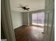 Comfortable bedroom with natural light, ceiling fan, and hardwood floors at 40 Canterbury Dr, Grantville, GA 30220