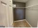 This closet features a neutral wall color, wire shelving, and tile floors at 40 Canterbury Dr, Grantville, GA 30220