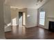 Inviting living room featuring a fireplace, vaulted ceiling, and hardwood floors at 40 Canterbury Dr, Grantville, GA 30220