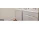 Laundry room showing a white washing machine and dryer at 434 Selborne Way, Chattahoochee Hills, GA 30268