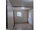 Spacious unfinished basement with exposed ceiling and concrete block walls at 6521 King William Dr, Morrow, GA 30260