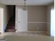 Dining room with tile flooring, and a view of the staircase and a sliding glass door at 6521 King William Dr, Morrow, GA 30260