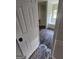 Bathroom view with tub, hardwood flooring, window, and natural light at 1857 Oak Hill Springs Blvd, Lithonia, GA 30058