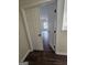 View into a bedroom featuring wood-look floors and a window with bright natural light at 1857 Oak Hill Springs Blvd, Lithonia, GA 30058