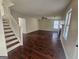 Cozy living room showcasing hardwood floors, a ceiling fan, and fireplace at 1857 Oak Hill Springs Blvd, Lithonia, GA 30058