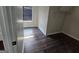 An empty walk-in closet with wire rack shelving and hardwood flooring at 1857 Oak Hill Springs Blvd, Lithonia, GA 30058
