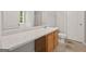Bright bathroom featuring a vanity with cabinets, and a toilet at 60 Charlotte Blvd, Stockbridge, GA 30281