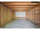 Inside a wooden storage shed with ample space and shelving for tools and equipment at 60 Charlotte Blvd, Stockbridge, GA 30281