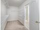 Spacious walk-in closet with shelving provides ample storage space at 249 Edenwylde Ct, Hampton, GA 30228