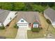 An aerial view of a well-maintained home featuring a two car garage at 161 Spring Creek Blvd, Mcdonough, GA 30253