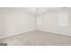 Neutral bedroom with carpet, fan, and windows allowing natural light at 161 Spring Creek Blvd, Mcdonough, GA 30253