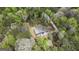 A tranquil modern home surrounded by lush trees is at the end of a winding driveway for privacy at 803 Bentley Hill Rd, Stockbridge, GA 30281