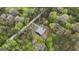 A secluded home sits amongst a verdant forest with winding roads and trails at 803 Bentley Hill Rd, Stockbridge, GA 30281
