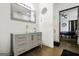 Bathroom with stylish vanity, modern sink, and connecting door to the primary bedroom at 803 Bentley Hill Rd, Stockbridge, GA 30281