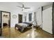 Cozy bedroom with ceiling fan, natural light, and an en-suite bath for added convenience at 803 Bentley Hill Rd, Stockbridge, GA 30281