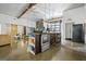 The bright kitchen features modern appliances and garage-door windows for indoor-outdoor entertaining at 803 Bentley Hill Rd, Stockbridge, GA 30281