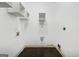 Basic laundry room with a utility sink and available connections for a washer and dryer at 803 Bentley Hill Rd, Stockbridge, GA 30281