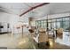 Expansive living area showcases modern design with bar seating, a large window, and open layout at 803 Bentley Hill Rd, Stockbridge, GA 30281
