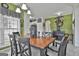 Cozy dining room with a view of the kitchen and an arched doorway, perfect for entertaining guests at 198 Crestwood Rd, Tyrone, GA 30290