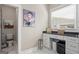 Modern bathroom with vanity, sink, toilet and window at 5124 N Pratt St, Covington, GA 30014