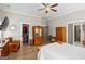 Large bedroom with walk-in closet and hardwood floors at 5124 N Pratt St, Covington, GA 30014