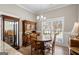 Traditional dining room with hardwood floors, wooden furniture, and natural light at 5124 N Pratt St, Covington, GA 30014