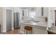 Well-equipped kitchen featuring granite countertops, stainless steel appliances, and white cabinetry at 5124 N Pratt St, Covington, GA 30014