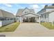 Rear exterior showcasing a covered parking area with room for seating and entertainment at 5124 N Pratt St, Covington, GA 30014