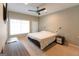 Inviting bedroom with comfortable carpet, a ceiling fan, and natural light at 702 Las Brasis Ct, Peachtree City, GA 30269