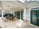 Community patio features outdoor seating, ceiling fans, and access to community pool at 702 Las Brasis Ct, Peachtree City, GA 30269