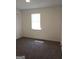 Cozy bedroom with plush carpeting and a bright window at 1172 Sheffield Ct, Jonesboro, GA 30238