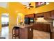 Bright kitchen features an island with seating, stainless steel appliances, and attractive countertops at 4050 Old Fairburn Rd, Atlanta, GA 30349