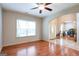 Living room with hardwood floors, archway, and large window at 4050 Old Fairburn Rd, Atlanta, GA 30349