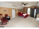 Carpeted bedroom with a cozy sleeping area, window with curtains, and ample free space at 500 Hayfield Ct, Locust Grove, GA 30248