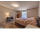 Comfortable bedroom with a neutral color palette, creating a peaceful retreat at 133 Springer Rd, Whitesburg, GA 30185