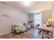 Bedroom featuring a sofa, desk, and wood-look flooring at 133 Springer Rd, Whitesburg, GA 30185